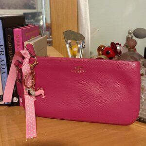 COACH LARGE PINK WRISTLET WITH CARD SLOTS INSIDE